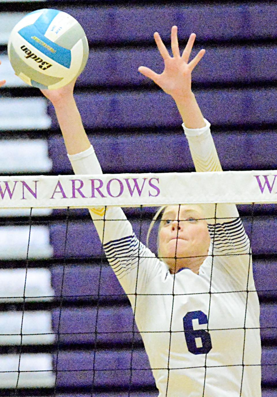 Watertown's Eve Hauger attempts to block the ball during a high school volleyball match against Sioux Falls Lincoln on Tuesday, Oct. 11, 2022 in the Civic Arena. Lincoln won 3-1.