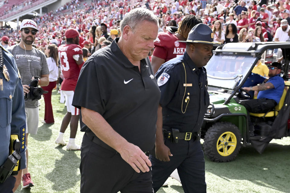 Arkansas coach Sam Pittman heads to the locker room after losing to Mississippi State in an NCAA college football game Saturday, Oct. 21, 2023, in Fayetteville, Ark. (AP Photo/Michael Woods)