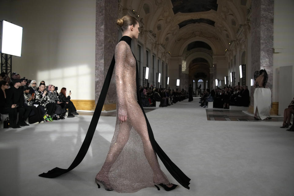 A model wears a creation for Schiaparelli's Haute Couture Spring-Summer 2024 collection presented in Paris, Monday, Jan. 22, 2024. (AP Photo/Christophe Ena)