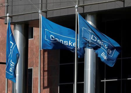 FILE PHOTO: Danske Bank flags flutter at the bank's Estonian branch in Tallinn, Estonia August 3, 2018. REUTERS/Ints Kalnins/File Photo