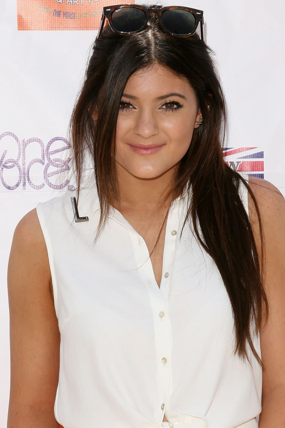 <p>Jenner looked perfectly summer-ready with a spray tan at a 2012 event.</p>