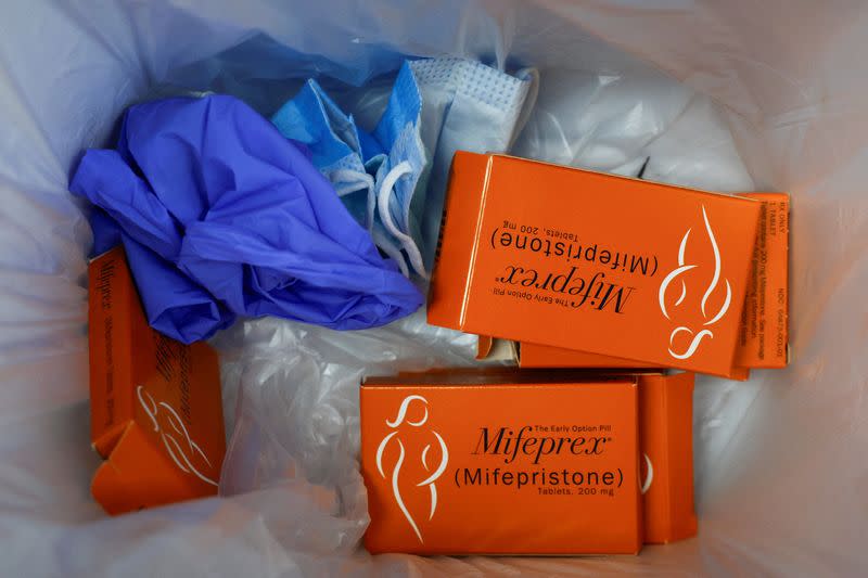 FILE PHOTO: Used packages of Mifepristone, the first pill in a medical abortion, lie in the trash at Alamo Women's Clinic in Carbondale, Illinois