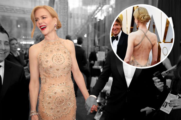 The strap on Nicole Kidman’s Oscars dress snapped, but she was able to fix it before hitting the red carpet. (Photo: Getty Images)