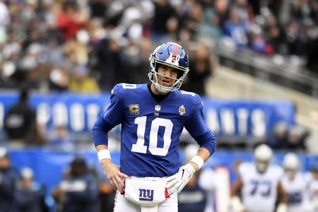 Dec 30, 2018; East Rutherford, NJ, USA; New York Giants quarterback Eli Manning (10) reacts after throwing an interception in the endzone in the first drive of the game against the Dallas Cowboys at MetLife Stadium. Mandatory Credit: Danielle Parhizkaran/NorthJersey.com via USA TODAY NETWORK