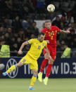 Belgium's Toby Alderweireld, right, and Kazakhstan's Gafurzhan Suyumbayev head the ball during the Euro 2020 group I qualifying soccer match between Kazakhstan and Belgium at the Astana Arena stadium in Nur-Sultan, Kazakhstan, Sunday, Oct. 13, 2019. (AP Photo)