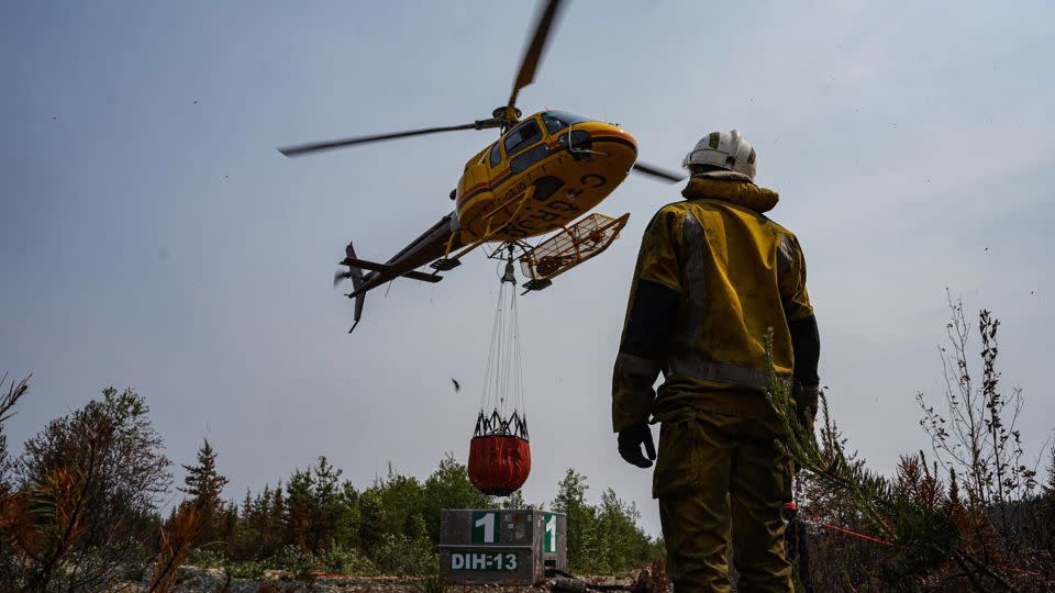 French firefighters try to extinguish wildfires at Lac Larouche in Quebec, Canada, on June 28, 2023.  - Lieutenant Emma UIISC7/SOPFEU/Anadolu Agency/Getty Images
