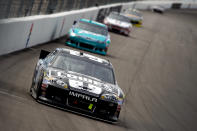 LAS VEGAS, NV - MARCH 11: Jimmie Johnson, driver of the #48 Lowe's/Kobalt Tools Chevrolet, leads the field during the NASCAR Sprint Cup Series Kobalt Tools 400 at Las Vegas Motor Speedway on March 11, 2012 in Las Vegas, Nevada. (Photo by Todd Warshaw/Getty Images for NASCAR)