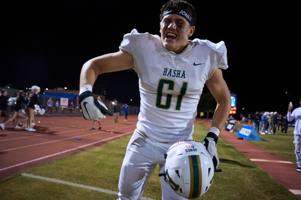 Oct 28, 2022; Chandler, AZ, USA; Basha Bears defensive end Brody Jones (61) jumps with joy as his team take the lead over the Chandler Wolves at Austin Field in Chandler on Friday, Oct. 28, 2022. Mandatory Credit: Alex Gould/The Republic