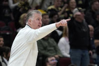 CORRECTS DAY/DATE TO SUNDAY, MARCH 12 INSTEAD OF SATURDAY, MARCH 11 - Purdue head coach Matt Painter directs his team during the first half of an NCAA college basketball championship game against Penn State at the Big Ten men's tournament, Sunday, March 12, 2023, in Chicago. (AP Photo/Nam Y. Huh)