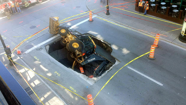 An aerial view of the sinkhole that opened up this morning on St-Catherine Street.