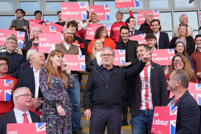 Labour Party leader Sir Keir Starmer with deputy leader Angela Rayner addressing party activists at Harlow Town Football Club, in Harlow, Essex, to encourage them to continue their work taking Labour's offer to voters ahead of the local elections on Thursday. Picture date: Wednesday May 1, 2024. PA Photo. See PA story POLITICS Labour. Photo credit should read: Stefan Rousseau/PA Wire