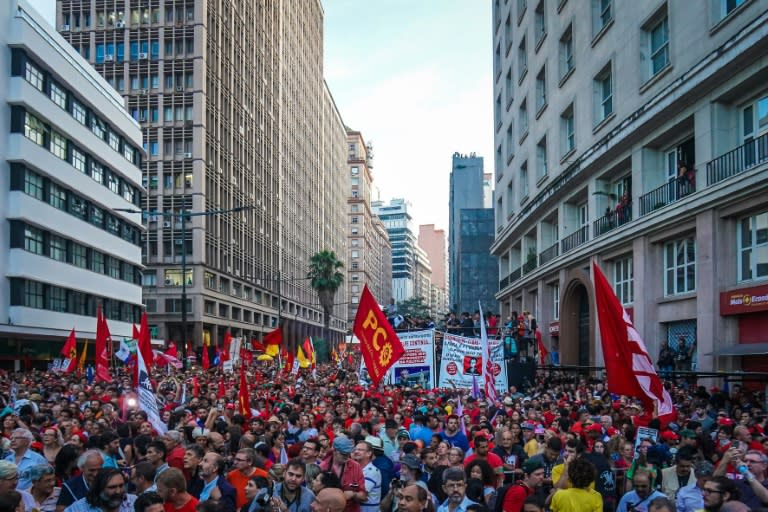 A crowd of 70,000 listens to former President Luiz Inacio Lula da Silva speak in the center of Porto Alegre, Brazil