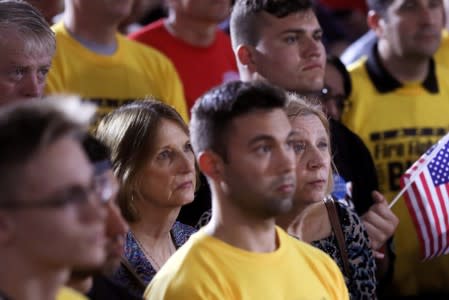 FILE PHOTO: Supporters listen as U.S. Democratic presidential candidate and former Vice President Joe Biden campaigns at union hall for 2020 Democratic presidential nomination in Pittsburgh