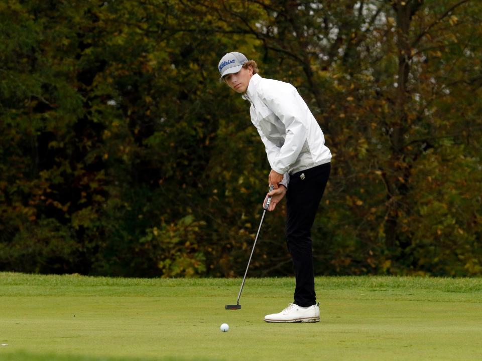 Maysville senior Owen Lutz strokes a birdie putt during the Division II state golf tournament on Saturday at NorthStar Golf Club in Sunbury. Lutz shot 82 and posted a two-day total of 163 as Maysville was fifth of 12 teams.