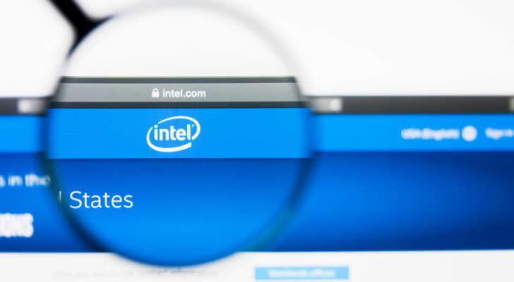 a magnifying glass enlarges the Intel logo on the company website