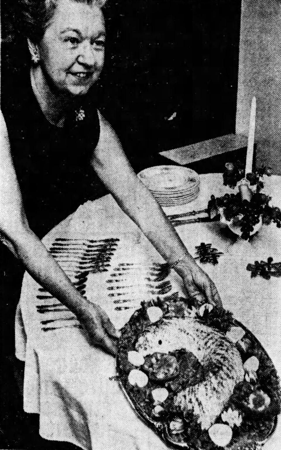 "Mrs. Maurice D. Collins of Indianapolis is well known for the beautiful seafood molds she arranges for buffet suppers." Her recipe for tuna mousse was included in the Nov. 19, 1967, Hoosier Holiday Cookbook.