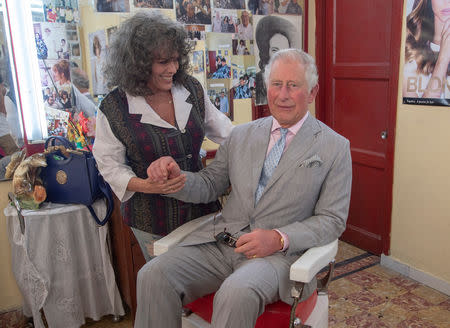 Britain's Prince Charles visits a barbershop in Havana, Cuba March 25, 2019. Arthur Edwards/Pool via REUTERS