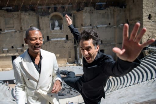 Let it fly: Mills (left) with French conductor Christophe Maglou at the Orange music festival in southern France where he is performing his "Light From The Outside World" concert