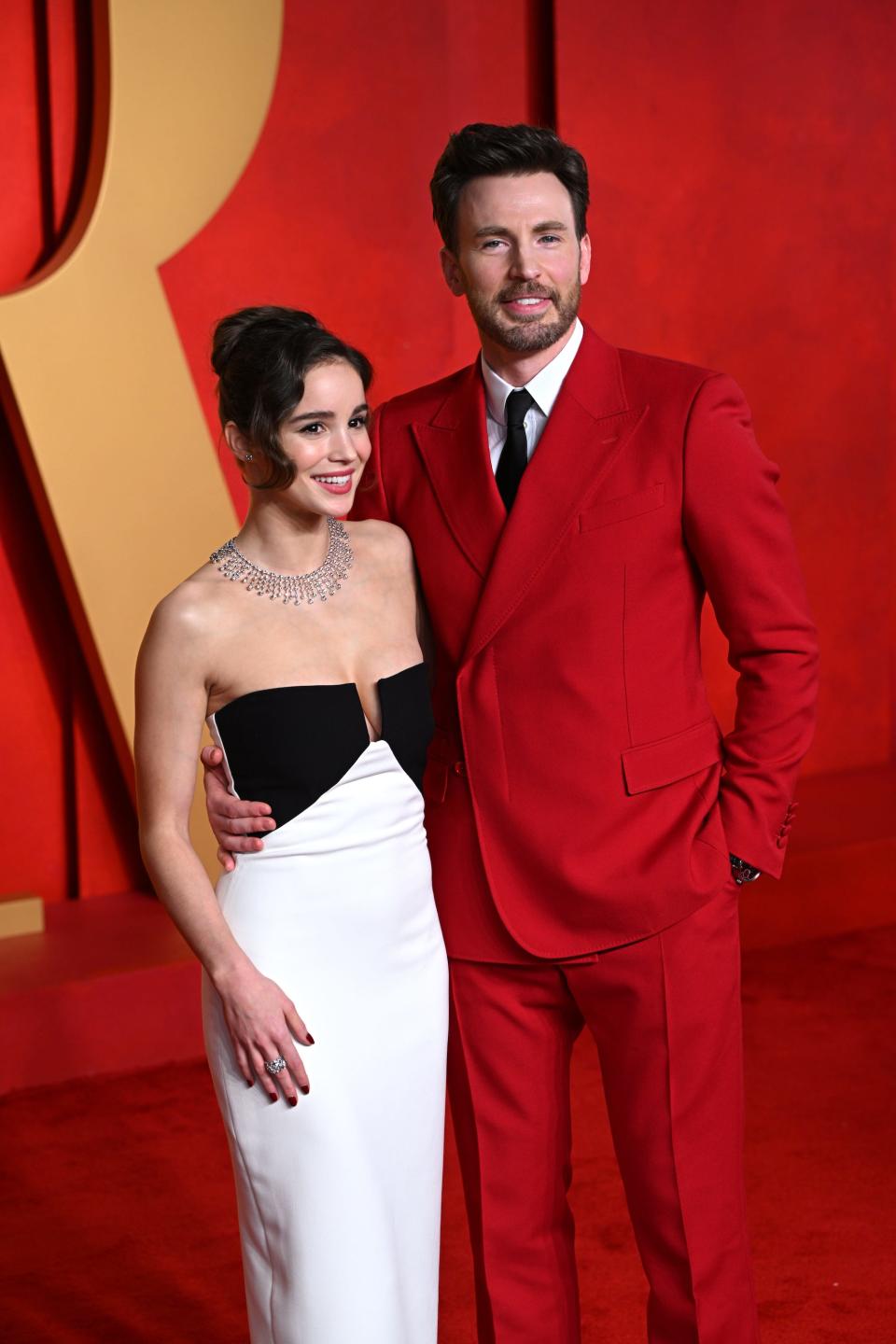 Alba Baptista and Chris Evans attending the 2024 Vanity Fair Oscar Party