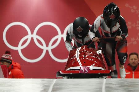 Bobsleigh - Pyeongchang 2018 Winter Olympics - Women's Competition - Olympic Sliding Centre - Pyeongchang, South Korea - February 20, 2018 - Christine de Bruin and Melissa Lotholz of Canada in action. REUTERS/Edgar Su