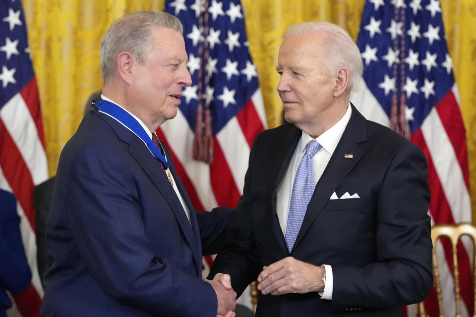 President Joe Biden awards the nation's highest civilian honor, the Presidential Medal of Freedom, to former Vice President Al Gore during a ceremony in the East Room of the White House, Friday, May 3, 2024, in Washington. (AP Photo/Alex Brandon)
