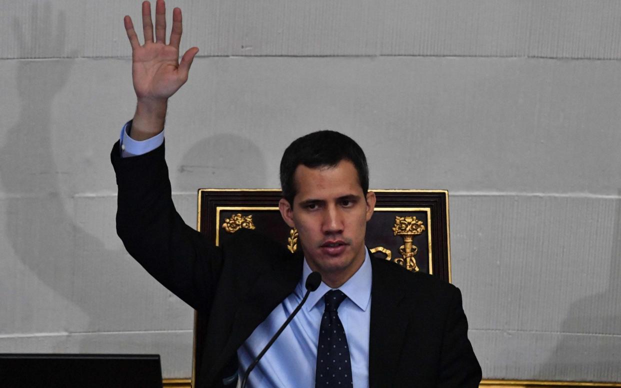 Venezuela's National Assembly head and self-proclaimed 'acting president' Juan Guaido said he believes the military is fed up of the regime - AFP
