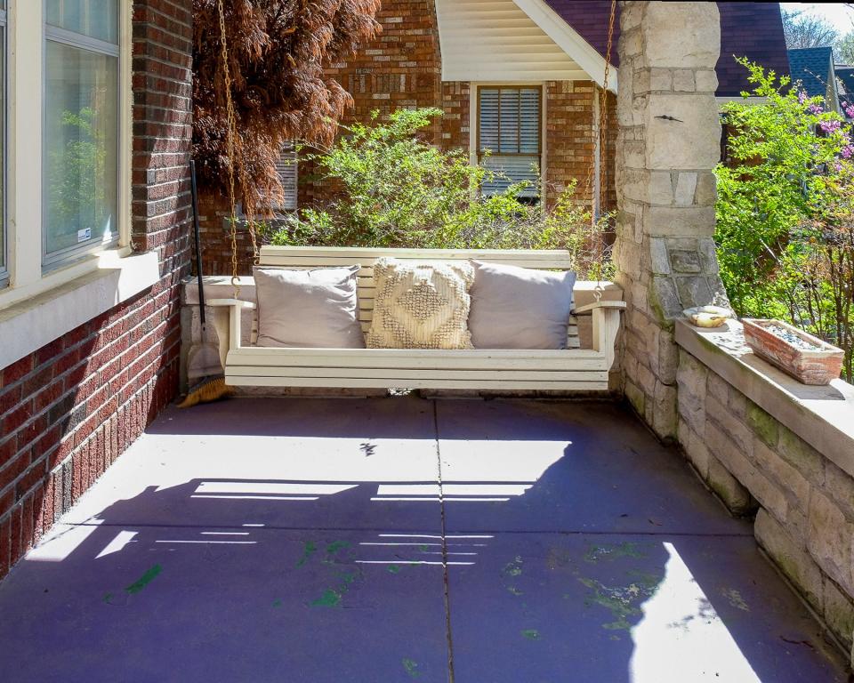 The front porch is a relaxing place to sit outside and get some sunshine.