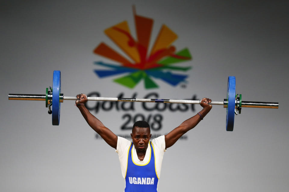 GOLD COAST, AUSTRALIA - APRIL 05:  Julius Ssekitoleko of Uganda competes during the Weightlifting Men's 56kg Final on day one of the Gold Coast 2018 Commonwealth Games at Carrara Sports and Leisure Centre on April 5, 2018 on the Gold Coast, Australia.  (Photo by Dean Mouhtaropoulos/Getty Images)