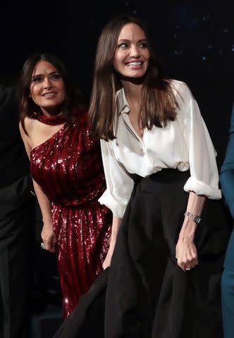 <p>James Gillham/Shutterstock</p> Salma Hayek (left) and Angelina Jolie in 2021