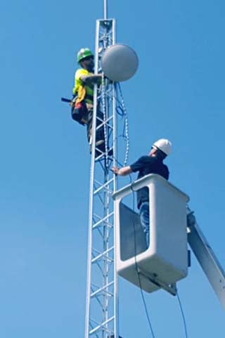 Mohawk Network field techs working on company towers. (Courtesy Mohawk Networks)