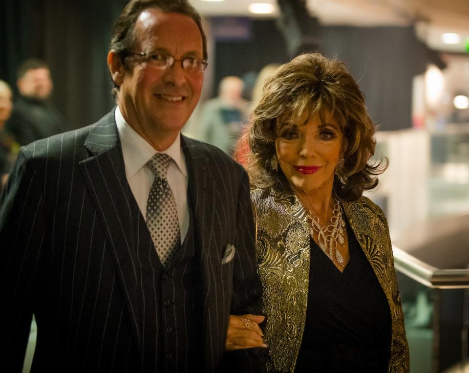 Percy Gibson and Joan Collins