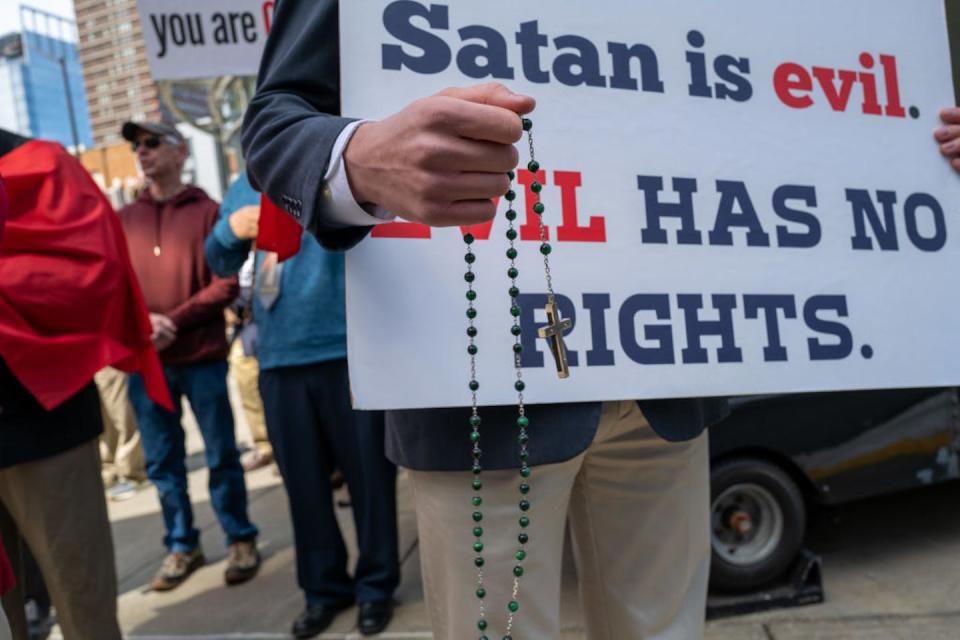 A Christian activist group demonstrates outside the Satanic Temple’s SatanCon, a convention held in Boston, on April 28, 2023. <a href="https://www.gettyimages.com/detail/news-photo/members-of-a-christian-activist-group-hold-a-demonstration-news-photo/1486162397?adppopup=true" rel="nofollow noopener" target="_blank" data-ylk="slk:Spencer Platt/Getty Images;elm:context_link;itc:0;sec:content-canvas" class="link ">Spencer Platt/Getty Images</a>