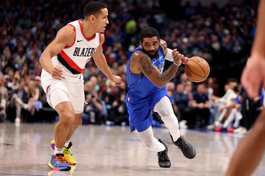 <em>Kyrie Irving #11 of the Dallas Mavericks drives to the basket against Malcolm Brogdon #11 of the Portland Trail Blazers in the second half at American Airlines Center on January 05, 2024 in Dallas, Texas. (Photo by Tim Heitman/Getty Images)</em>