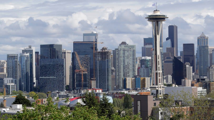 <em>The Space Needle and the Seattle skyline are shown against a cloudy sky on April 30, 2020, as seen from Kerry Park.</em> (AP Photo/Ted S. Warren)