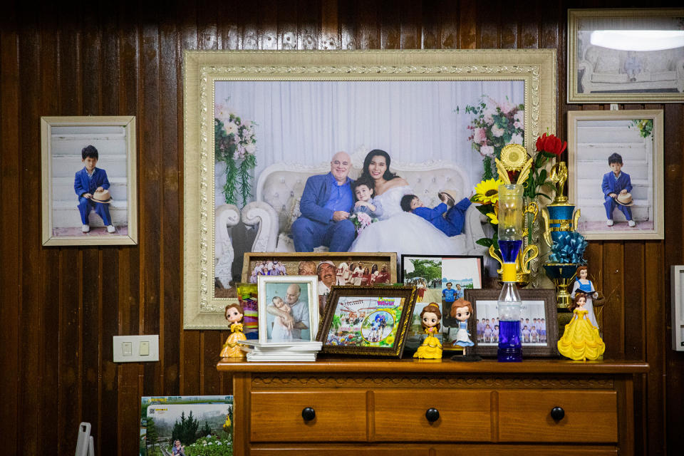 Family portraits hung on the walls of Gina and Lee's home.<span class="copyright">Lauren DeCicca for TIME</span>