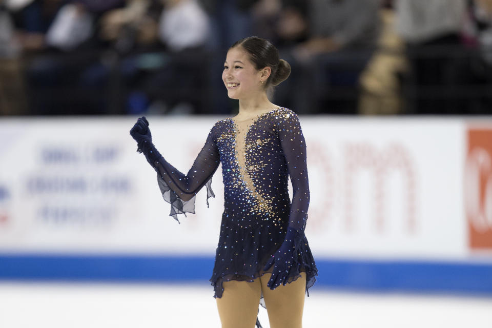 Alysa Liu gives a fist-pump upon competing her senior women's free skate program at the U.S. Figure Skating Championships, Friday, Jan. 24, 2020, in Greensboro, N.C. (AP Photo/Lynn Hey)