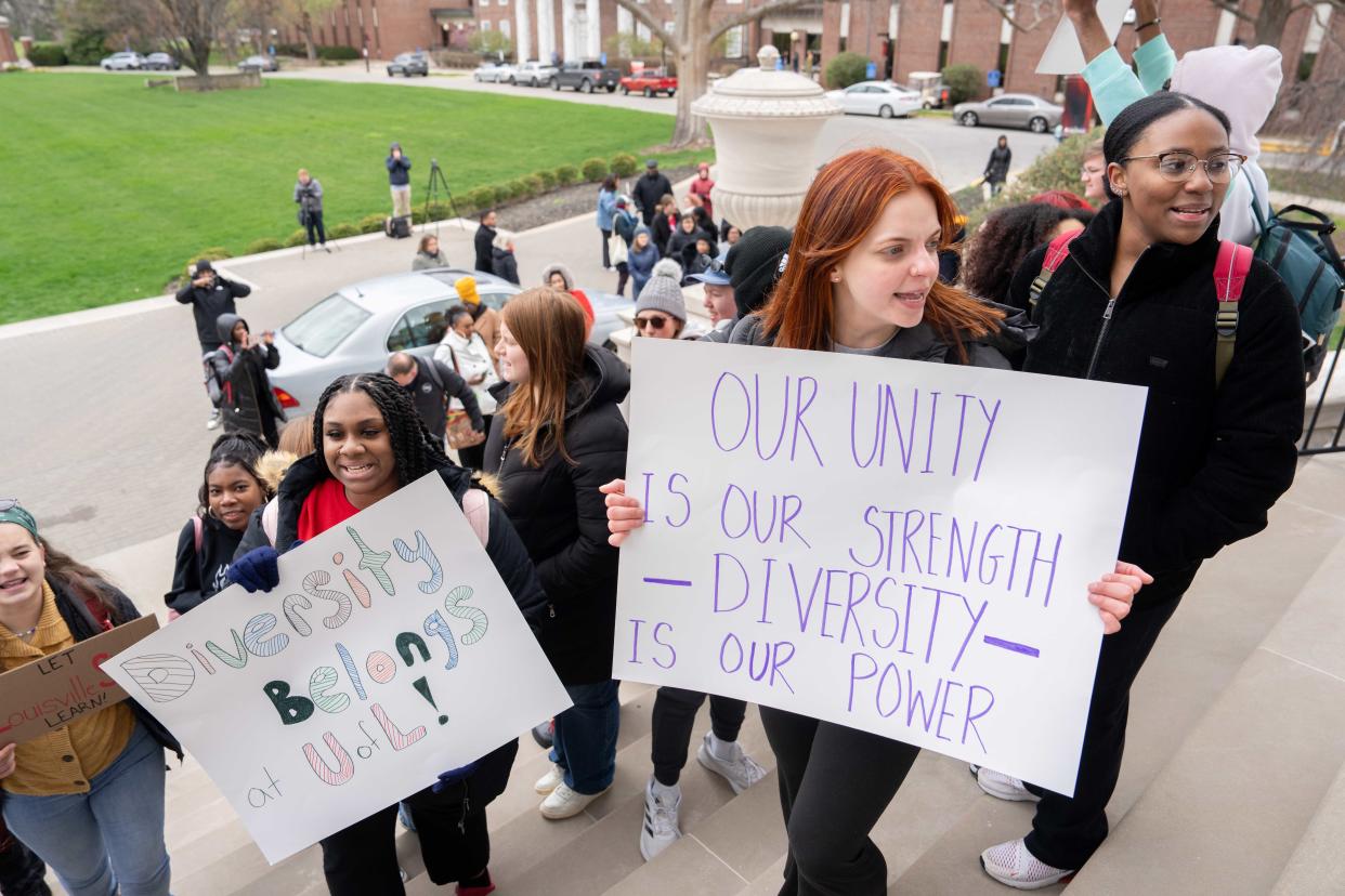 University of Louisville students, faculty and staff chant outside of Grawemeyer Hall during their rally to protect diversity, equity, and inclusion (DEI) on their campus on Monday, March 18, 2024.