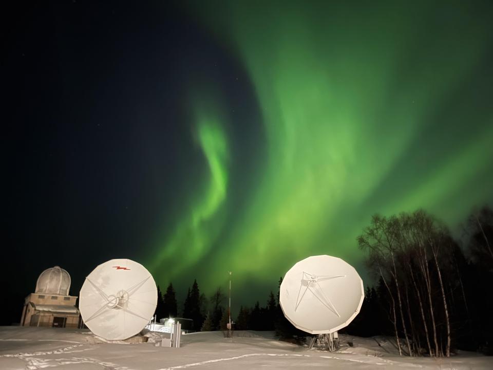 Brilliant defined auroras are seen in the sky