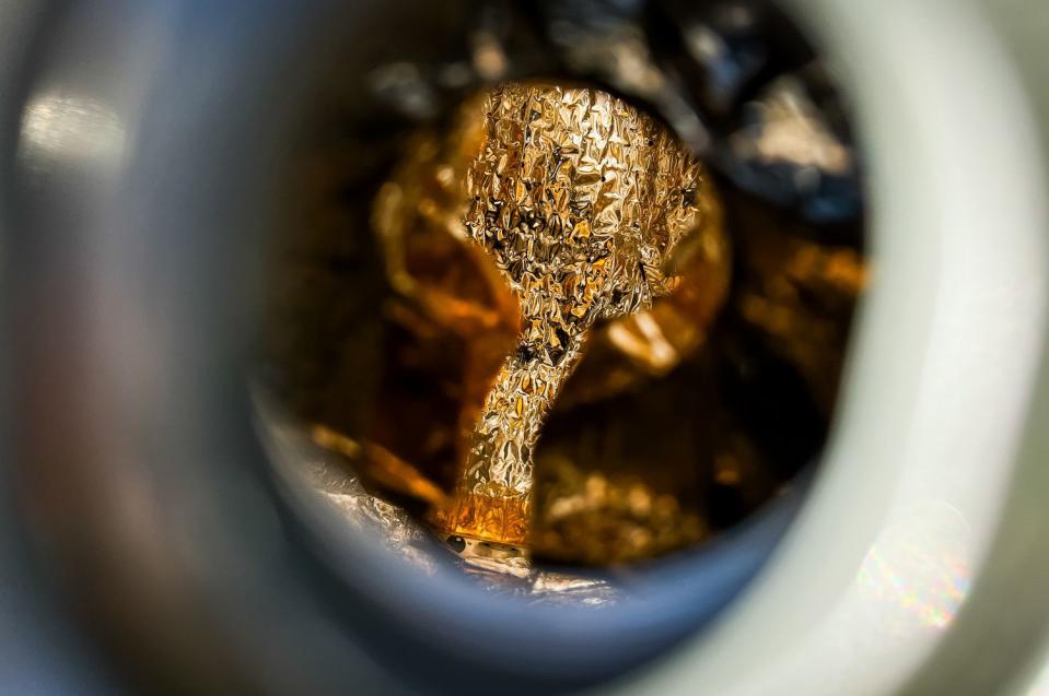 The interior of a rehearsal model of the sample return capsule on the OSIRIS-REx spacecraft is pictured through a small port in the capsule at Dugway Proving Grounds on Thursday.