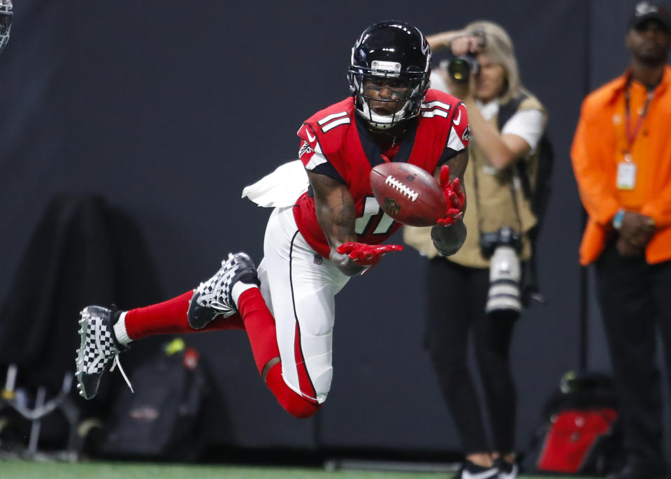 <p>Atlanta Falcons wide receiver Julio Jones (11) makes a reception for a touchdown in an NFL football game between the Arizona Cardinals and Atlanta Falcons on December 16, 2018 at Mercedes-Benz Stadium. (Photo by Todd Kirkland/Icon Sportswire) </p>