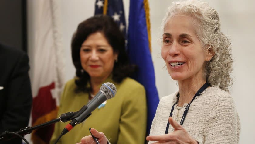 LOS ANGELES, CA - May 1, 2018: Dr. Barbara Ferrer, PhD, MPH, MEd, right, recently appointed the new Los Angeles County public health director by the Los Angeles County Board of Supervisors at a press conference on May 1, 2018 for the Los Angeles Reproductive Health Equity Project for Foster Youth (LA RHEP), funded by the Conrad N. Hilton Foundation which is a new public-private partnership serving LA County and constituents. LA RHEP brings together County departments, foster youth, and the agencies that serve them to promote evidence-informed strategies that reduce unplanned pregnancies and dismantle systemic barriers to health education and services for youth in foster care. Last year, Supervisor Solis, joined by Supervisor Sheila Kuehl, introduced a motion directing County departments to align with and participate in LA RHEP. The goal is to dramatically reduce unintended pregnancy rates for youth in care over the next ten years. (Al Seib / Los Angeles Times)