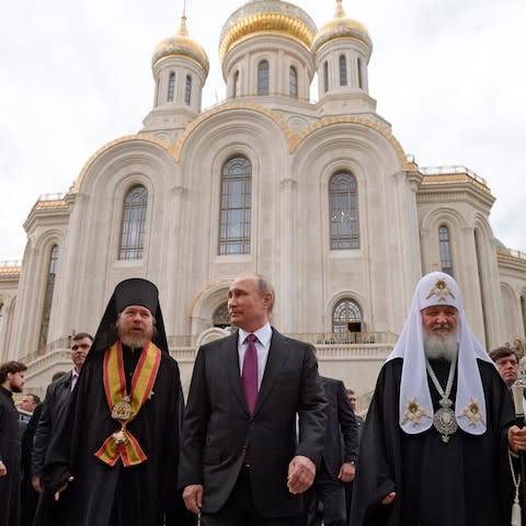 Bishop Tikhon and Patriarch Kirill accompany Vladimir Putin on a visit to the Sretensky Monastery in Moscow in May. - Credit: Alexei Druzhinin/Kremlin Pool Photo via AP, File