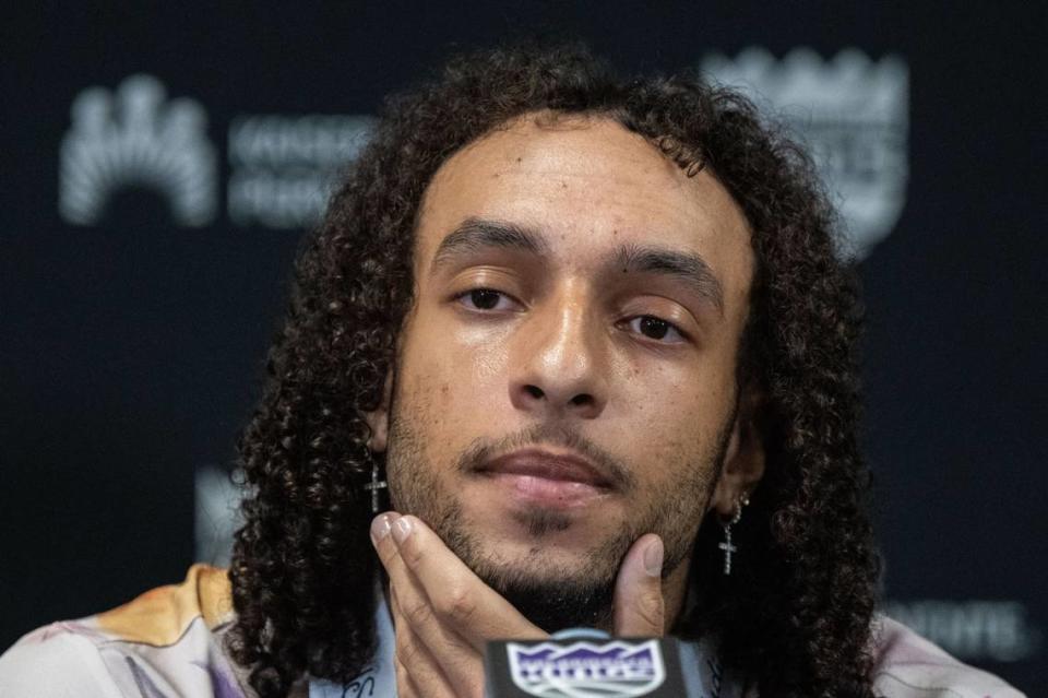 Sacramento Kings Devin Carter who was drafted from Providence listens to a question on Tuesday. Carter said he remembers living in Roseville when his father Anthony Carter was a Kings assistant.