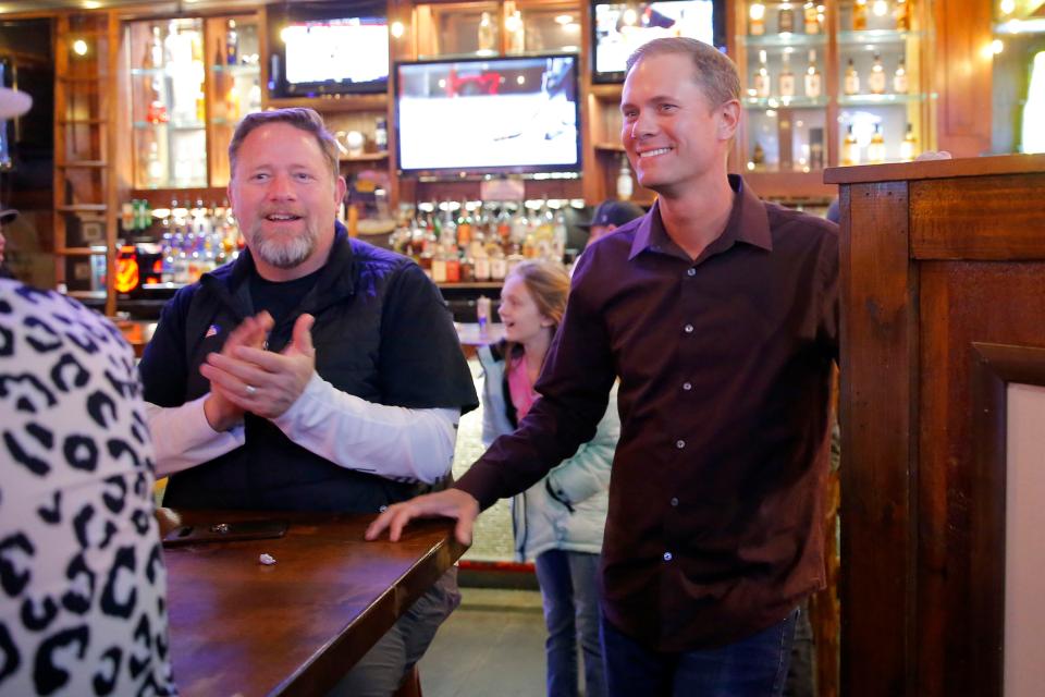 Oklahoma City mayoral candidate Frank Urbanic talks with supporters during a watch party in Oklahoma City, Tuesday, Feb. 8, 2022. 