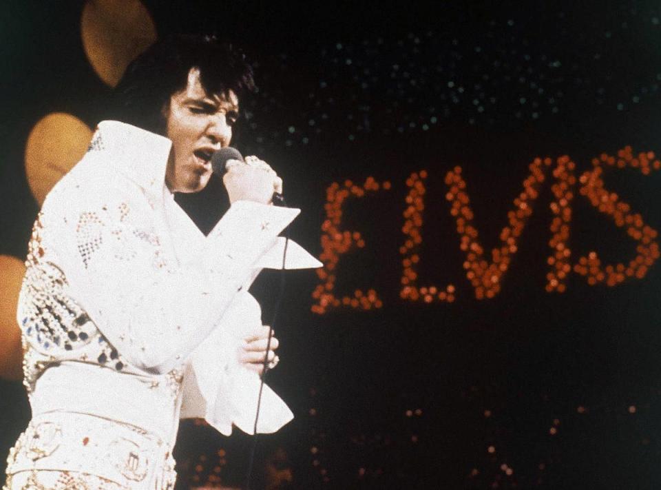 This 1972 file photo shows Elvis Presley, the King of Rock “n” Roll, during a performance.