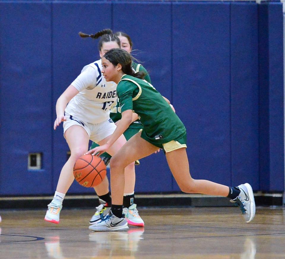 New Bedford Voc’s Kaira Dubois attempts to dribble past Somerset Berkley’s Mia Gentile.