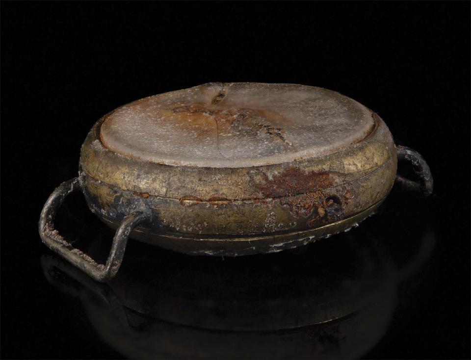 This photo provided by RR Auction shows a watch melted during the Aug.6, 1945 bombing of Hiroshima. The watch is frozen in time at the moment of detonation of the atomic bomb over the city during the closing days of World War ll, sold at auction Thursday, Feb. 22, 2024 for more than $31,000. (Nikki Brickett/RR Auction via AP)