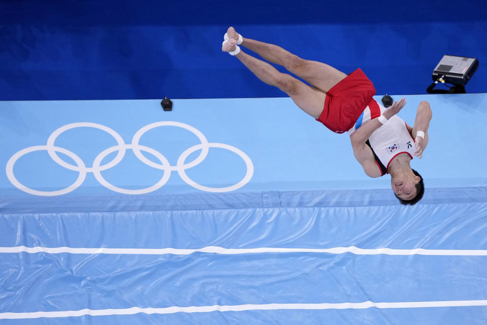 FILE - In this Aug. 2, 2021, file photo, Shin Jea-hwan, of South Korea, performs on the vault during the artistic gymnastics men's apparatus final at the 2020 Summer Olympics in Tokyo, Japan. The 50th artistic gymnastics world championships started Monday, Oct. 18, 2021 and will continue through Sunday in Kitakyushu, featuring more than 300 gymnasts representing 59 countries. (AP Photo/Jeff Roberson, File)