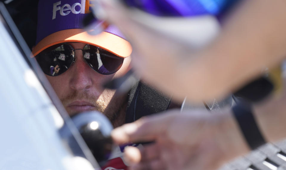 Denny Hamlin prepares to drives during practice for the NASCAR Cup Series auto race at Texas Motor Speedway in Fort Worth, Texas, Saturday, Sept. 24, 2022. (AP Photo/LM Otero)