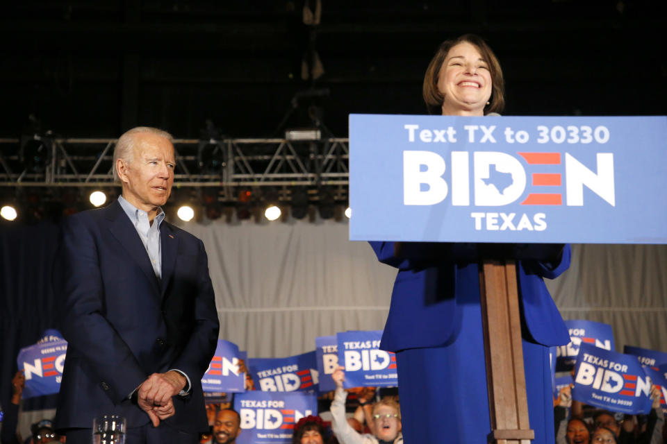 Sen. Amy Klobuchar joins former Vice President Joe Biden on stage during a campaign event in Texas ahead of the Super Tuesday vote. (Photo: Ron Jenkins via Getty Images)